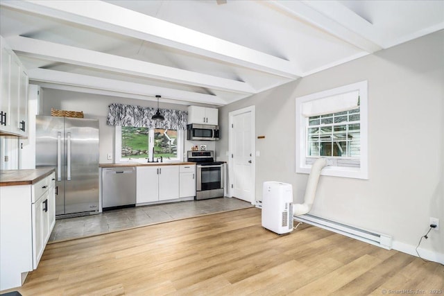 69 Forest Dr, Newtown, CT 06482 - kitchen featuring stainless steel appliances, beam ceiling, wooden counters, white cabinetry, and light wood finished floors