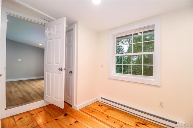 69 Forest Dr, Newtown, CT 06482 - unfurnished room with baseboard heating, light wood-style floors, and recessed lighting