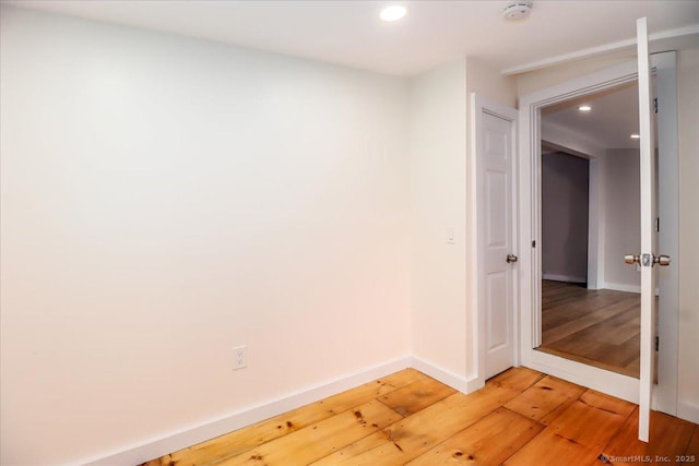 69 Forest Dr, Newtown, CT 06482 - unfurnished room with a smoke detector, recessed lighting, and light wood finished floors