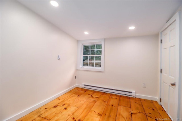 69 Forest Dr, Newtown, CT 06482 - unfurnished room featuring baseboard heating, light wood-type flooring, and recessed lighting