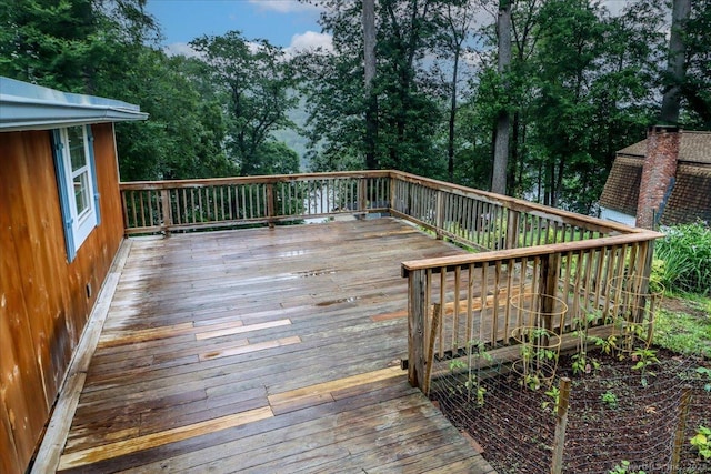 69 Forest Dr, Newtown, CT 06482 - wooden deck with view of wooded area