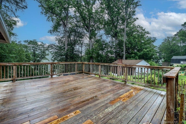69 Forest Dr, Newtown, CT 06482 - wooden deck with view of wooded area