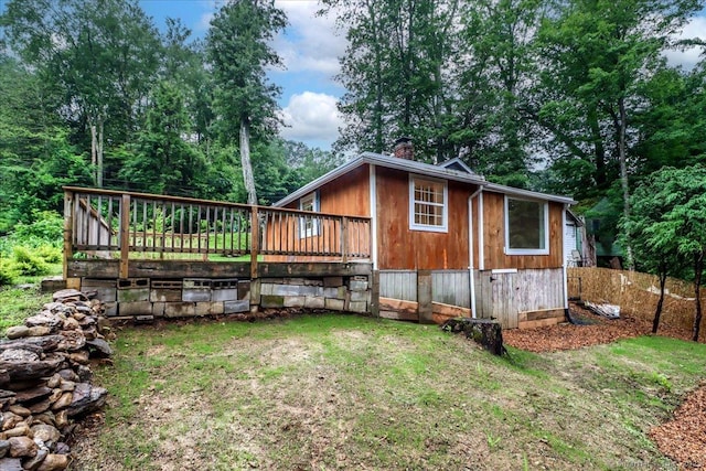69 Forest Dr, Newtown, CT 06482 - rear view of property featuring a wooden deck and a chimney