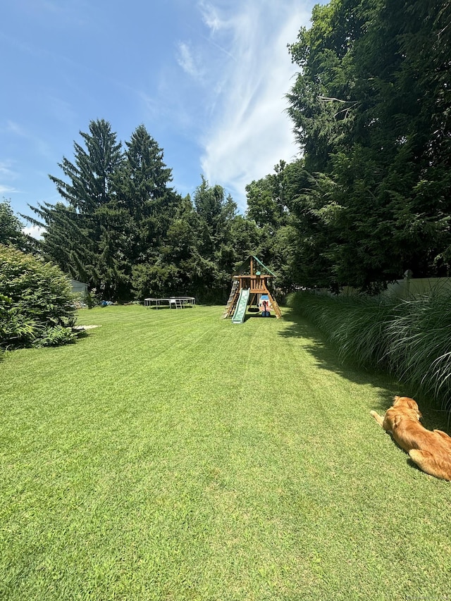 24 Cambridge Dr, Southington, CT 06489 - view of green lawn with a playground