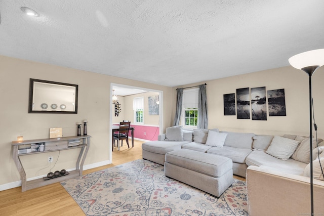 24 Cambridge Dr, Southington, CT 06489 - living area featuring a textured ceiling and wood finished floors