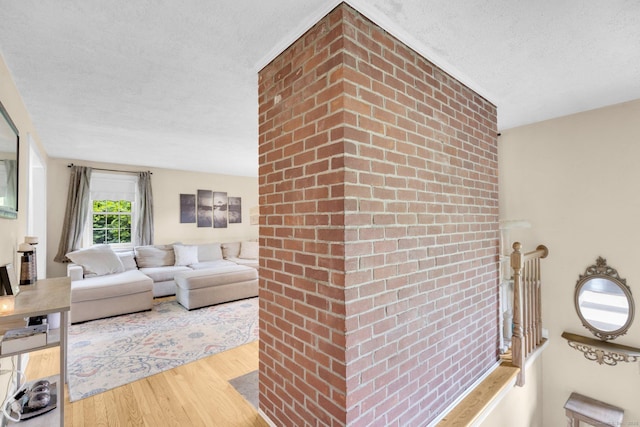24 Cambridge Dr, Southington, CT 06489 - living area with a textured ceiling and wood finished floors