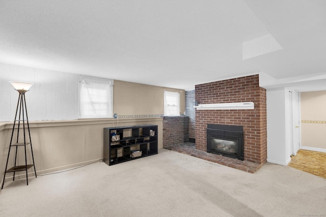 24 Cambridge Dr, Southington, CT 06489 - unfurnished living room featuring carpet and a brick fireplace