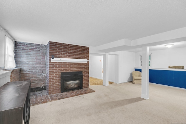 24 Cambridge Dr, Southington, CT 06489 - unfurnished living room featuring carpet flooring, a brick fireplace, and a textured ceiling
