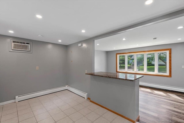 29 Pembroke Rd, Hamden, CT 06514 - unfurnished room featuring a baseboard radiator, recessed lighting, an AC wall unit, and a baseboard heating unit