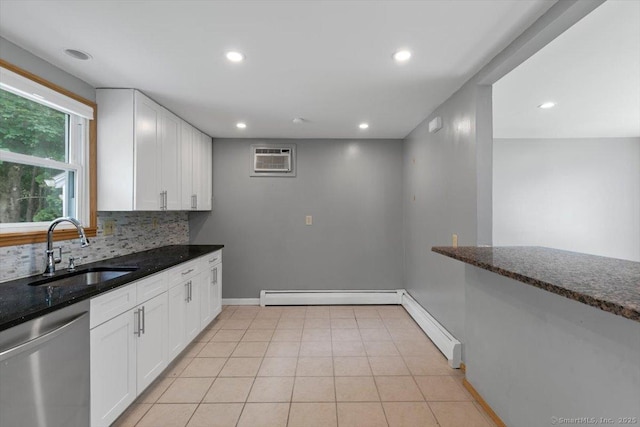 29 Pembroke Rd, Hamden, CT 06514 - kitchen with dishwasher, a baseboard heating unit, dark stone counters, recessed lighting, and white cabinets