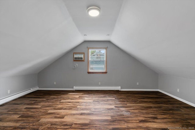 29 Pembroke Rd, Hamden, CT 06514 - bonus room featuring a baseboard heating unit, lofted ceiling, wood finished floors, and a wall mounted air conditioner