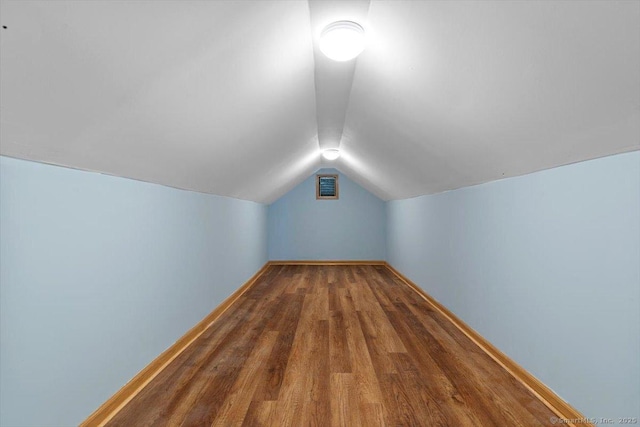 29 Pembroke Rd, Hamden, CT 06514 - additional living space with vaulted ceiling and wood finished floors