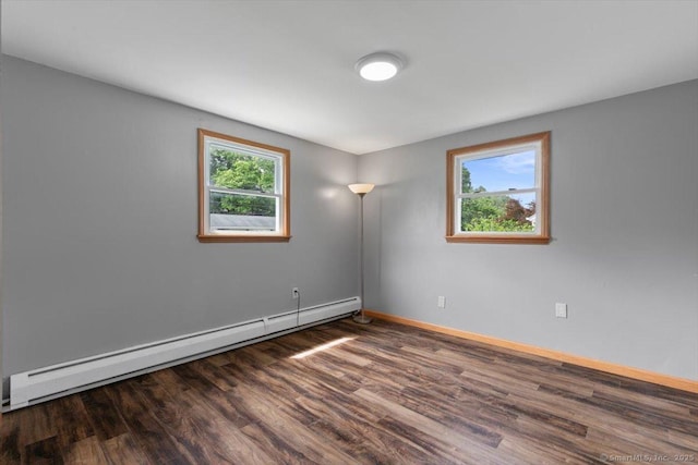 29 Pembroke Rd, Hamden, CT 06514 - unfurnished room featuring a baseboard radiator and wood finished floors