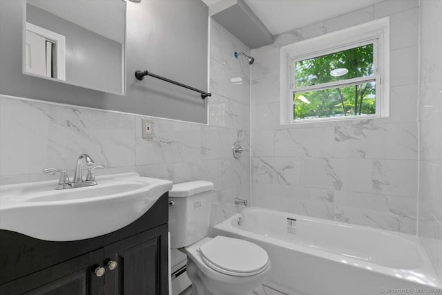 29 Pembroke Rd, Hamden, CT 06514 - bathroom featuring vanity, washtub / shower combination, and tile walls