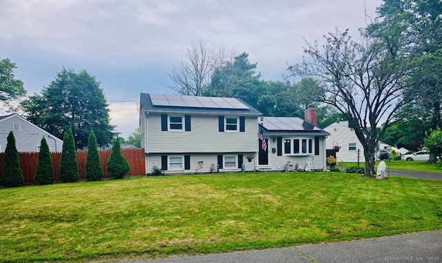 6 Pinecrest Dr, Plainville, CT 06062 - split level home featuring entry steps, solar panels, and a chimney