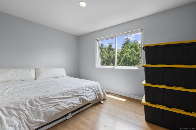 410 Farmington Ave Apt M2, New Britain, CT 06053 - bedroom with baseboards and light wood-style floors
