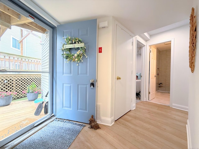 5 Mansfield Grove Rd Apt 146, East Haven, CT 06512 - entryway featuring baseboards and light wood-type flooring