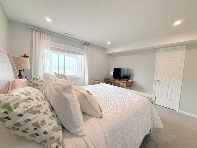 5 Mansfield Grove Rd Apt 146, East Haven, CT 06512 - bedroom featuring light colored carpet and recessed lighting