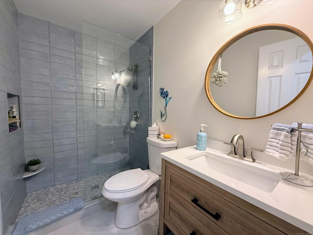 5 Mansfield Grove Rd Apt 146, East Haven, CT 06512 - bathroom featuring vanity, tiled shower, and tile patterned flooring