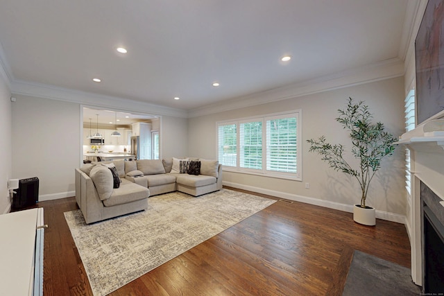 13 Spruce Ridge Dr, New Fairfield, CT 06812 - living room with a fireplace with flush hearth, ornamental molding, dark wood-style flooring, and recessed lighting