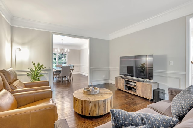 13 Spruce Ridge Dr, New Fairfield, CT 06812 - living area with a chandelier, dark wood finished floors, ornamental molding, a decorative wall, and wainscoting