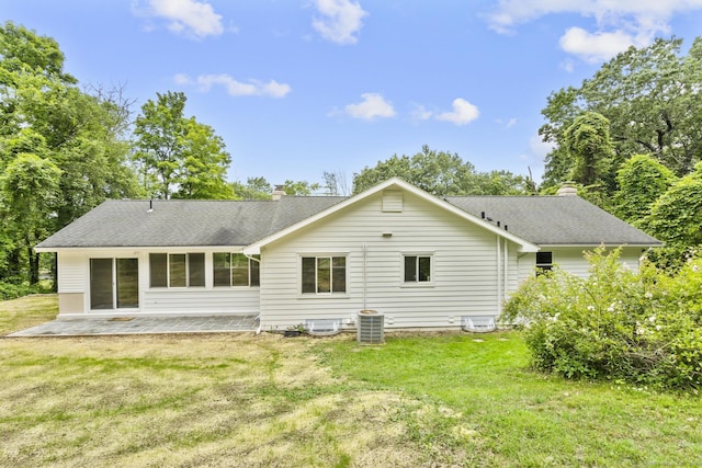 14 Pine Tree Ln, Avon, CT 06001 - back of property with a patio, a lawn, and a chimney