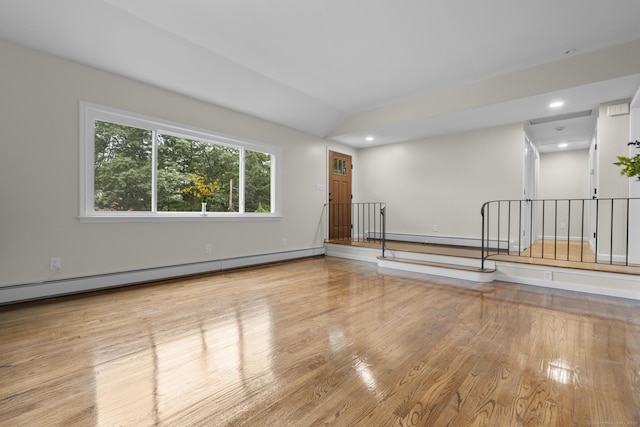 14 Pine Tree Ln, Avon, CT 06001 - spare room with wood finished floors, baseboard heating, recessed lighting, and vaulted ceiling