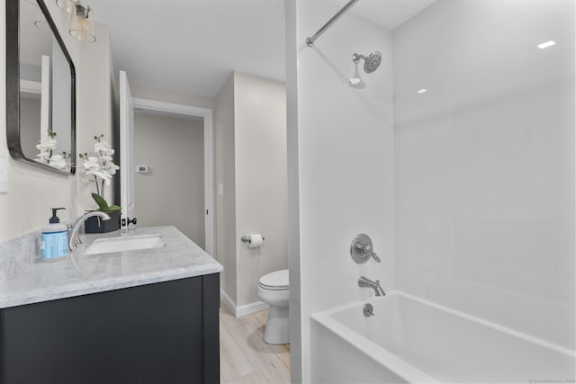 14 Pine Tree Ln, Avon, CT 06001 - bathroom featuring vanity, shower / bathtub combination, and wood finished floors