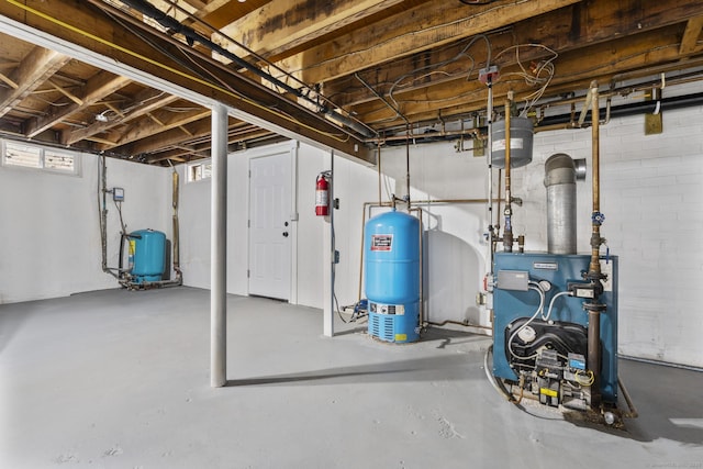 14 Pine Tree Ln, Avon, CT 06001 - below grade area featuring a water pressure tank and a heating unit