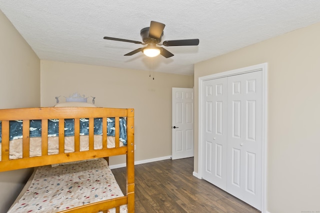 6 Weymouth Dr, Enfield, CT 06082 - bedroom with wood finished floors, a textured ceiling, a closet, and ceiling fan