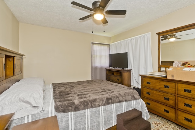6 Weymouth Dr, Enfield, CT 06082 - bedroom with a textured ceiling and ceiling fan