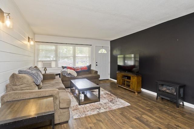 6 Weymouth Dr, Enfield, CT 06082 - living area featuring a wood stove, wood finished floors, and cooling unit