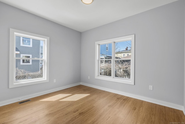 195 Arctic St, Bridgeport, CT 06608 - empty room featuring wood finished floors and baseboards
