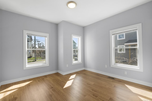 195 Arctic St, Bridgeport, CT 06608 - unfurnished room featuring baseboards and wood finished floors