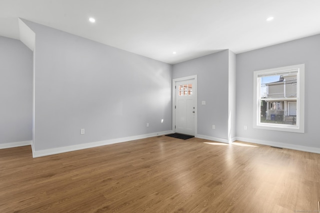 195 Arctic St, Bridgeport, CT 06608 - foyer entrance with healthy amount of natural light, wood finished floors, and recessed lighting