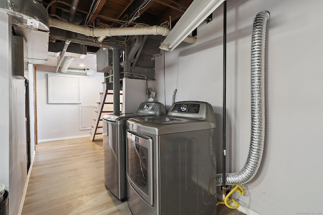 283 Third Ave, West Haven, CT 06516 - washroom with independent washer and dryer and wood finished floors