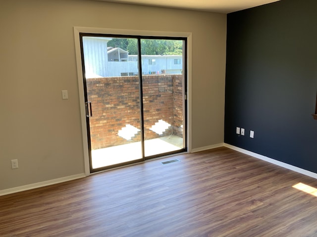 158 Webster Ct Unit 158, Newington, CT 06111 - spare room with wood finished floors and baseboards
