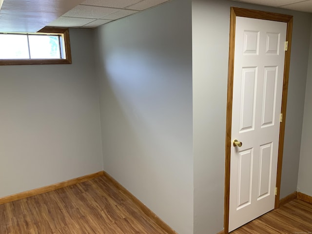 158 Webster Ct Unit 158, Newington, CT 06111 - basement with wood finished floors and a paneled ceiling
