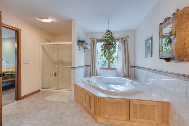 1047 Merrow Rd, Coventry, CT 06238 - bathroom featuring a stall shower, a bath, and tile patterned flooring