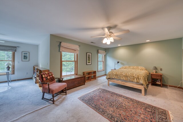 1047 Merrow Rd, Coventry, CT 06238 - carpeted bedroom with multiple windows, ceiling fan, and recessed lighting