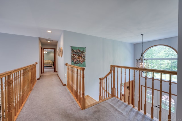 1047 Merrow Rd, Coventry, CT 06238 - corridor featuring an upstairs landing, carpet floors, a chandelier, and recessed lighting