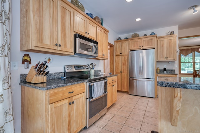 1047 Merrow Rd, Coventry, CT 06238 - kitchen with appliances with stainless steel finishes, light brown cabinets, light tile patterned floors, recessed lighting, and dark stone counters