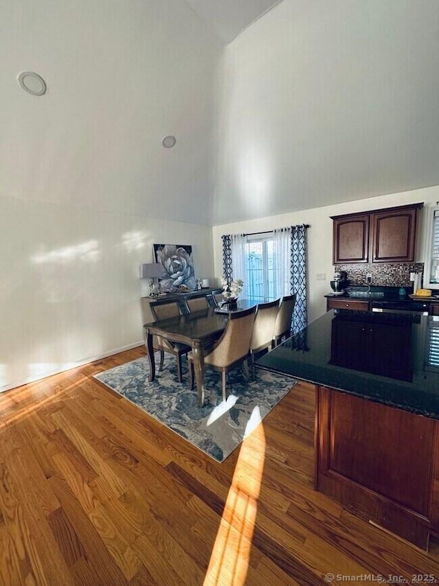 470 Nott St, Wethersfield, CT 06109 - home office with wood finished floors and high vaulted ceiling