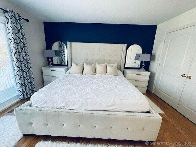 470 Nott St, Wethersfield, CT 06109 - bedroom featuring wood finished floors