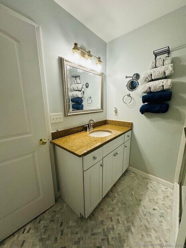 470 Nott St, Wethersfield, CT 06109 - bathroom featuring vanity and baseboards