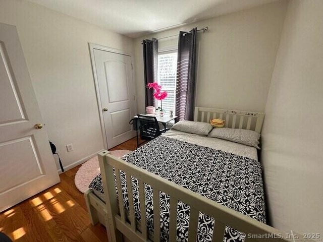 470 Nott St, Wethersfield, CT 06109 - bedroom featuring wood finished floors