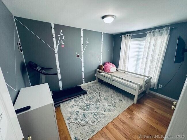 470 Nott St, Wethersfield, CT 06109 - bedroom featuring wood finished floors and baseboards