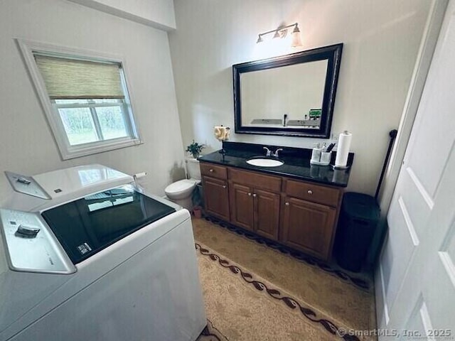 470 Nott St, Wethersfield, CT 06109 - bathroom featuring vanity and washing machine and dryer