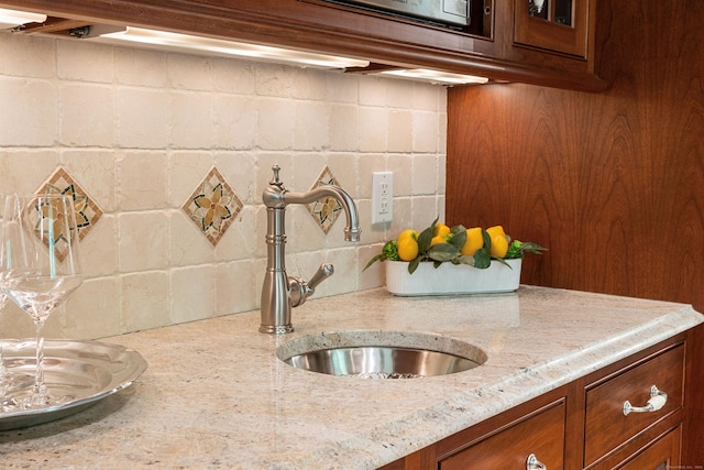 78 Carriage Rd, Wilton, CT 06897 - kitchen view of tasteful backsplash and light stone countertops