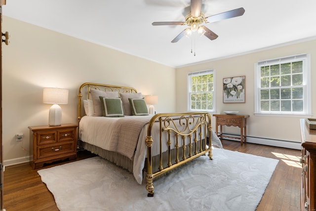 78 Carriage Rd, Wilton, CT 06897 - bedroom featuring a baseboard heating unit, ornamental molding, wood finished floors, and a ceiling fan